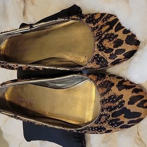 Leopard print beaded flats.
